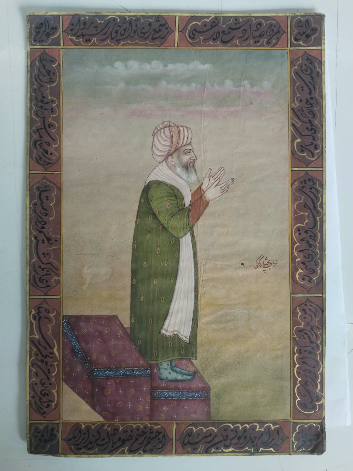 Mughal Miniature painting of a Sufi figure in a green robe
